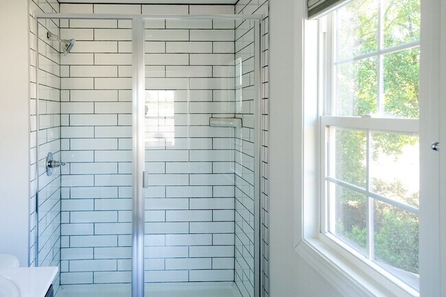 Building Photo - Like-new 3 bedroom, 2.5 bath house with an organic pond!