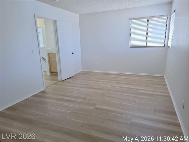 Building Photo - The Lakes Home with No Carpet, Fireplace & Covered Patio