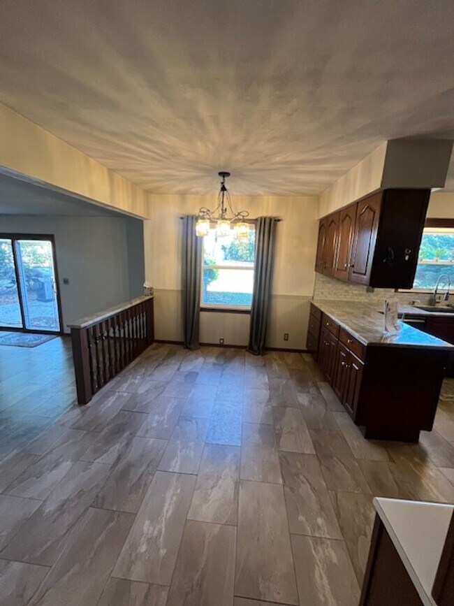 Building Photo - Spacious, Fully Updated Home with Walkout Basement on a Mature Lot