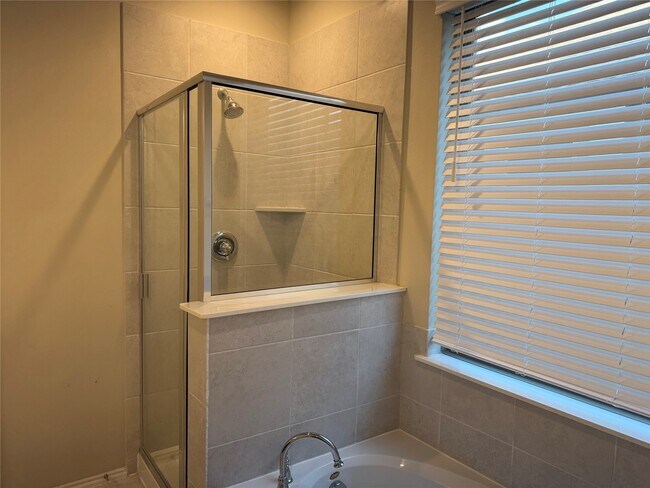 Building Photo - 8711 Windsong Trail Dr