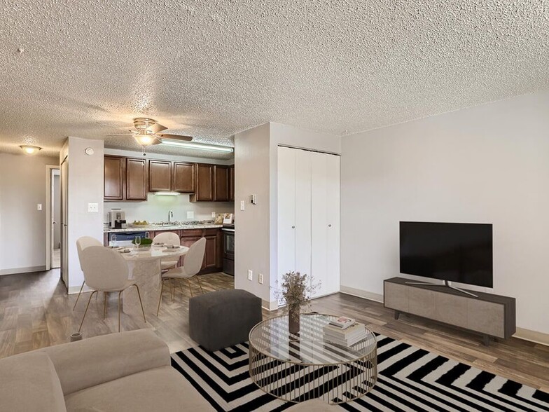 Expansive Living Space with Hardwood Style Flooring - Fox Hill Apartments