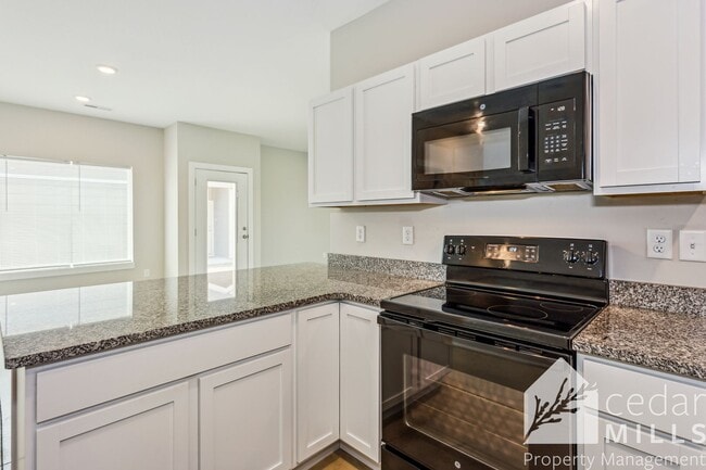 Building Photo - New Construction Across from McConnell! De...