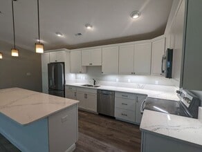 Building Photo - Experience modern living in this brand new...