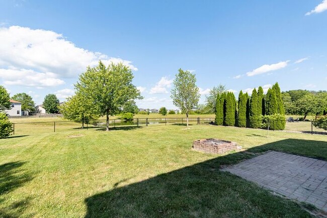 Building Photo - 4 Bedroom Home With Pond View in Top Rated...