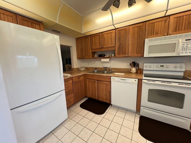 Building Photo - *55+ Community* 2nd floor furnished Condo