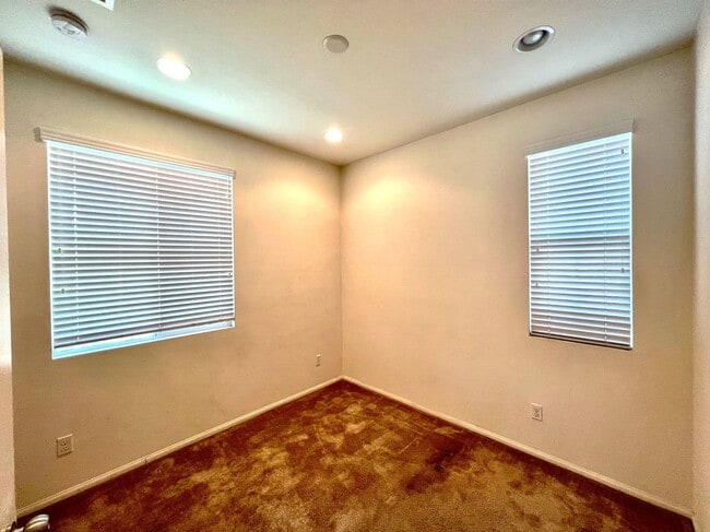 Building Photo - Beautiful 4 Bedroom Condominium with Attached Garage Located in Gated Community of Eastvale
