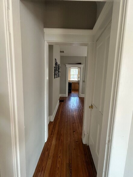 Hallway from living room to dining room and kitchen. - 1152 Jaeger St