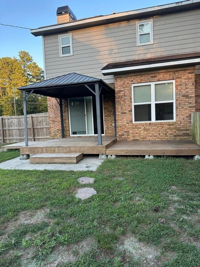 Building Photo - Move-In Ready Corner-Lot Home with Wraparound Porch Near Fort Eisenhower