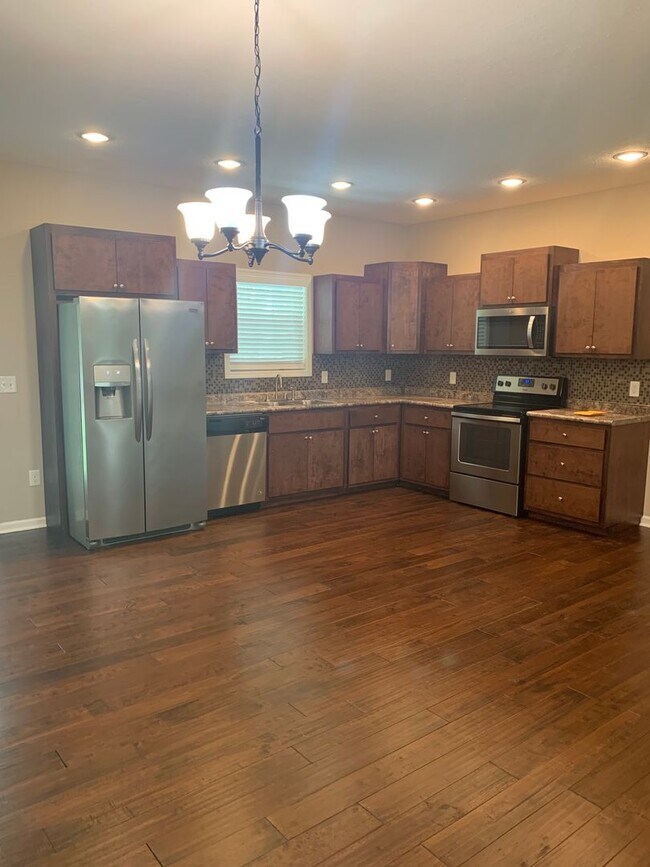 Building Photo - Modern comfort and privacy in the heart of...