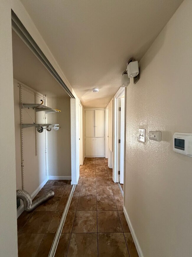 Building Photo - 3 Bedroom 2 Bathroom House with Central A/C , 2 Car Garage and Beautiful Backyard with Covered Patio