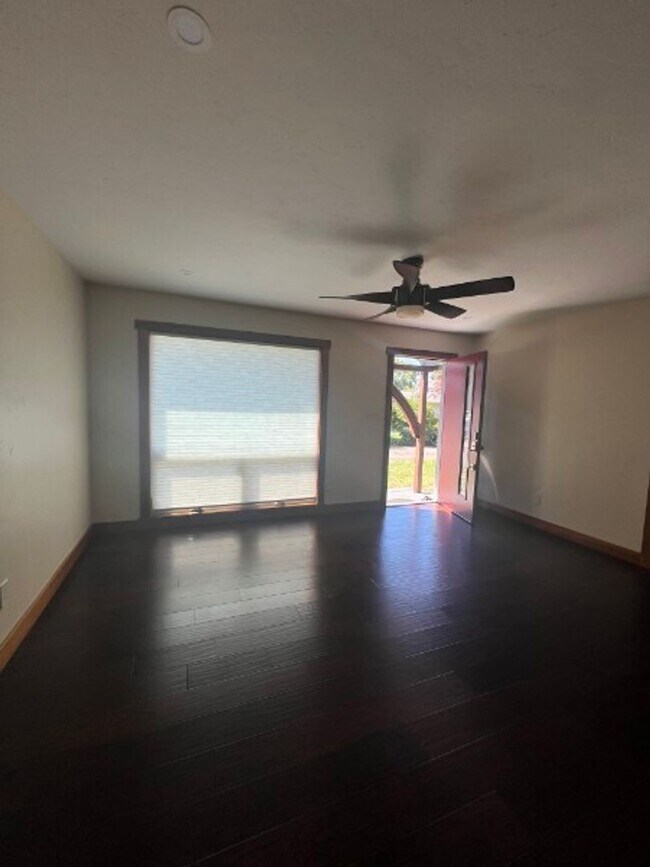 Building Photo - Artisan-Built Custom Cottage Retreat | Private Yard, Garage & EV Charging Ready