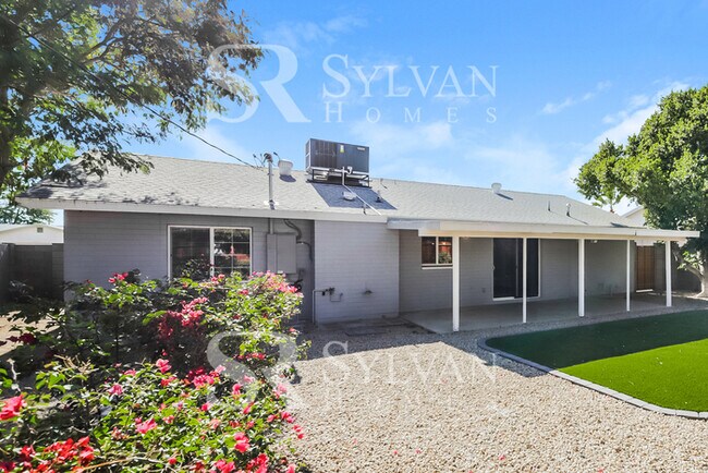 Building Photo - This lovely home is ready for your personal touch!