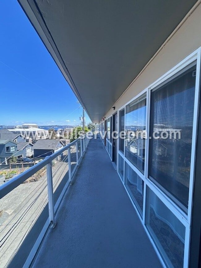 Building Photo - Alki Beach Living! Comfy 1 BD! Puget Sound Views! Super Sunsets!