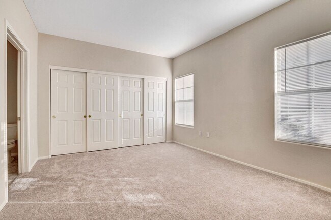 Building Photo - FIRST FLOOR CONDO IN GATED COMMUNITY W/ SINGLE CAR GARAGE