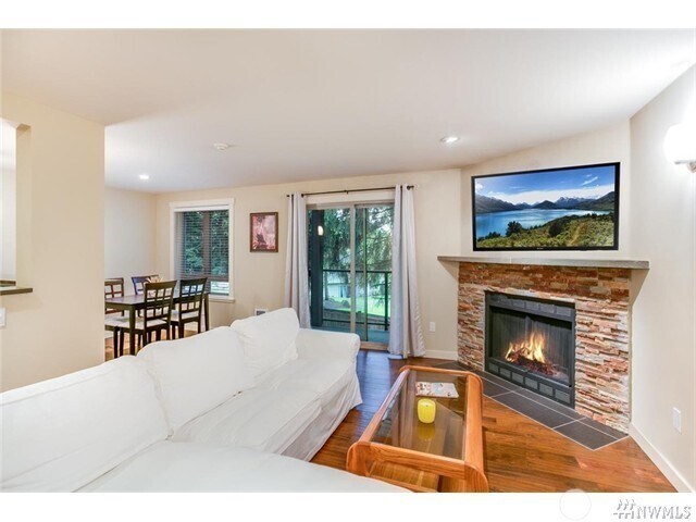 Slider Door opens to a nice greenspace on your Large Deck with Storage - 15140 NE 82nd St