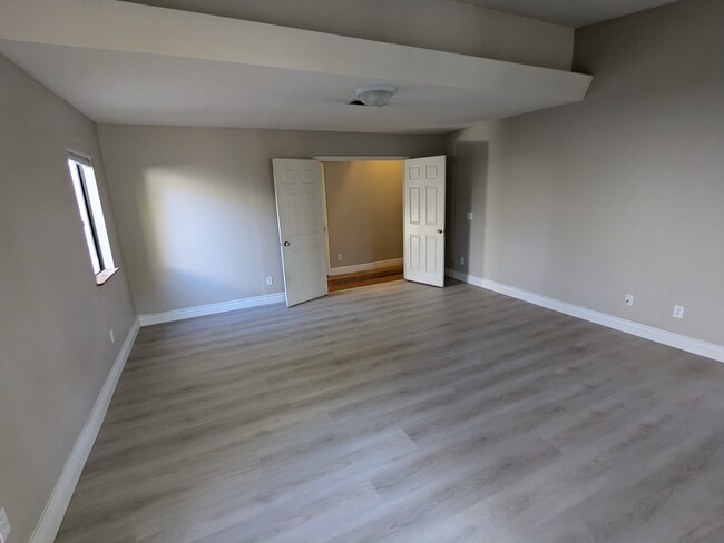 Master bedroom with new flooring - 3972 Ecochee Ave