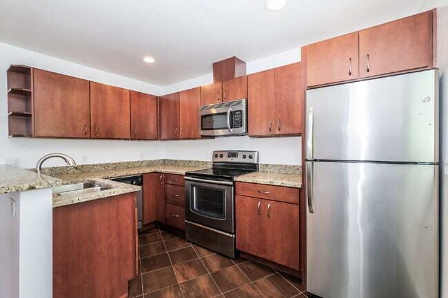 Building Photo - **Updated 2-Bedroom Condo with Secure Parking**