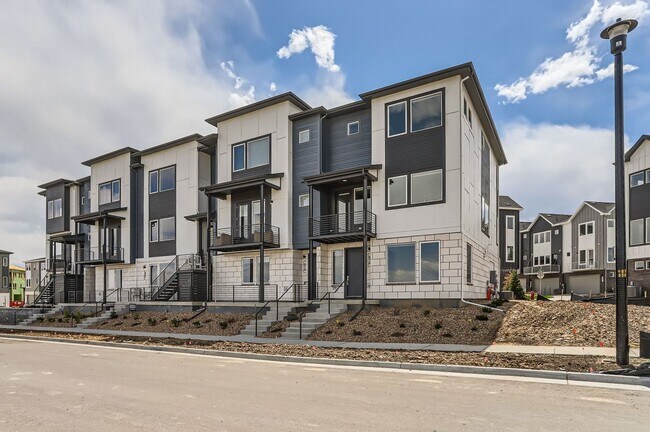 Building Photo - Brand New Build Three-Story Townhome in Er...