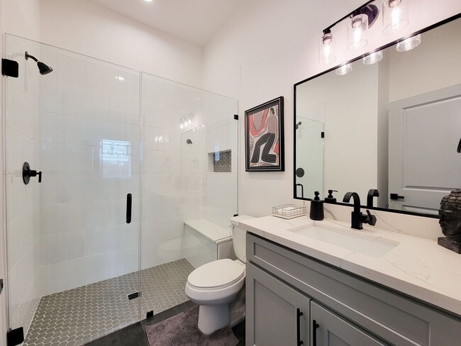 Building Photo - This 4-bedroom, 3-bathroom, two-story residence comes with a generous two-car attached garage. Re...