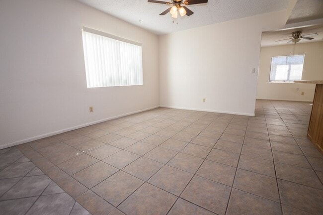 Building Photo - Welcome to this delightful 3-bedroom, 2-ba...