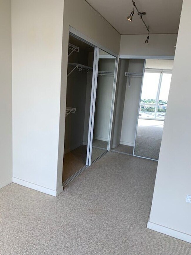 Building Photo - Moana Pacific - 2 bedroom plus den, 2 bath Condo with 2 parking - avail now!