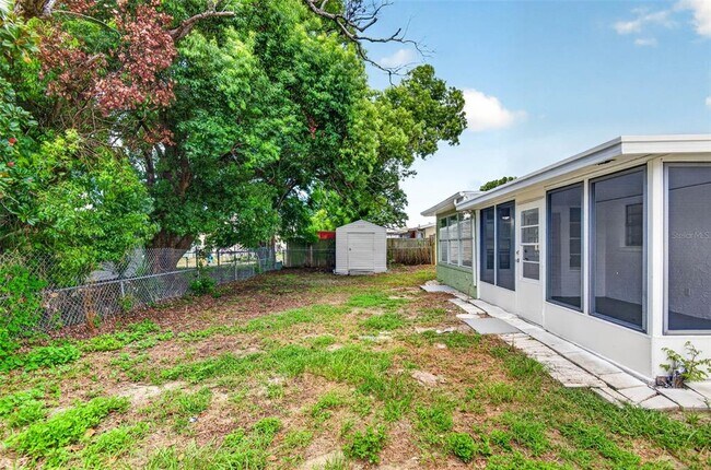 Building Photo - 8905 Tropical Palm Way