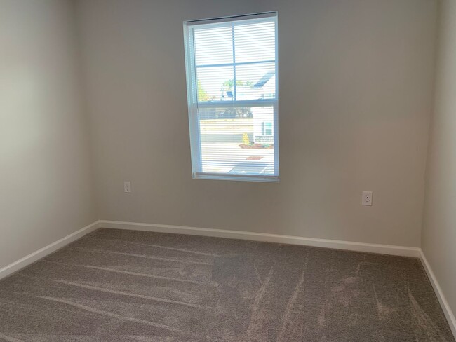 Building Photo - Gorgeous New Construction Townhome! Great ...