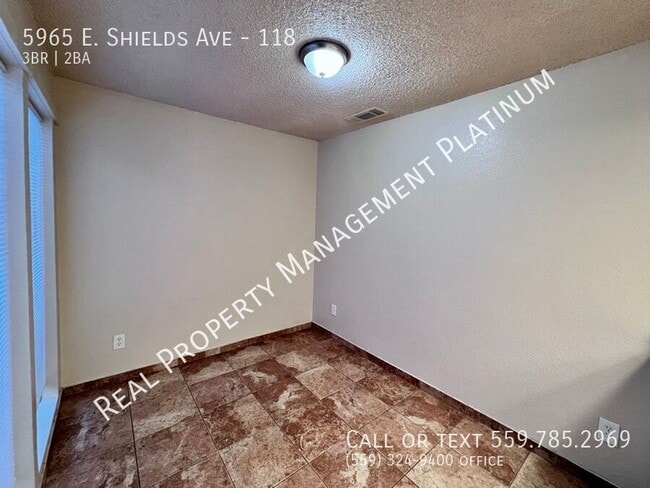 Building Photo - 5965 E Shields Ave