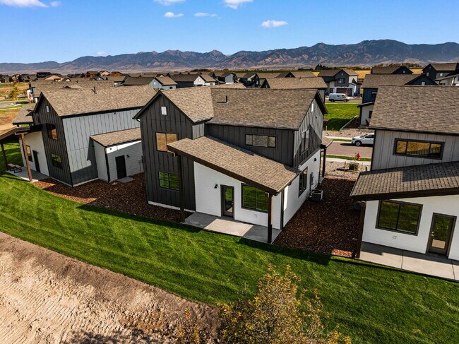 Building Photo - Lock-and-Leave Luxury Living — Lawn Care & Snow Removal Included!