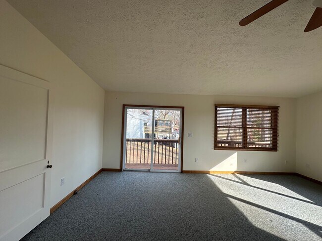 Building Photo - House in Bedford with Lot of Outdoor Space.