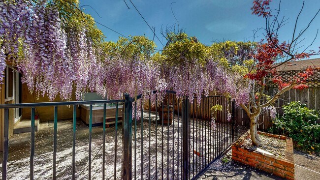 Building Photo - PURE Property Management - Stunning four-b...