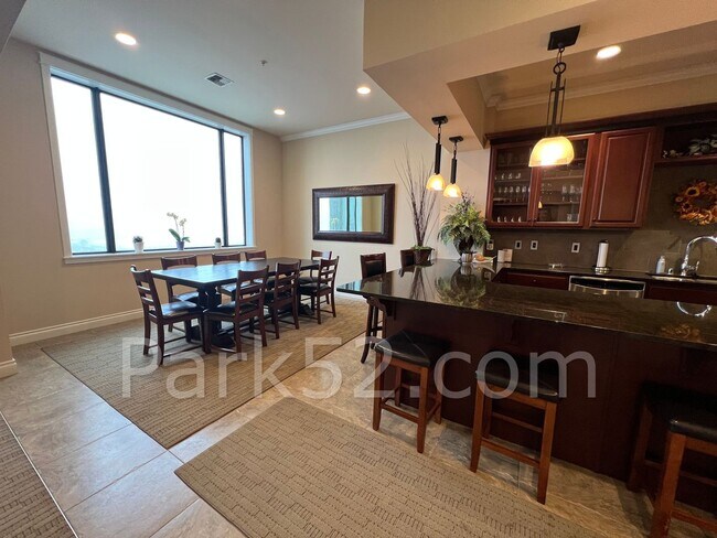 Building Photo - 1 Bed 1.5 Bath Theater District Condo + Amenities