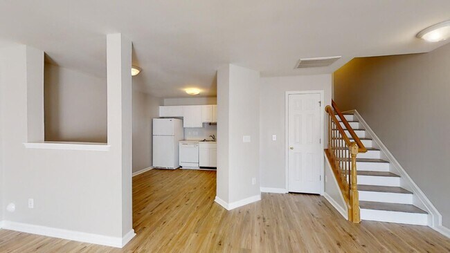 Building Photo - Townhome | Hard Surface Floors Through-Out...