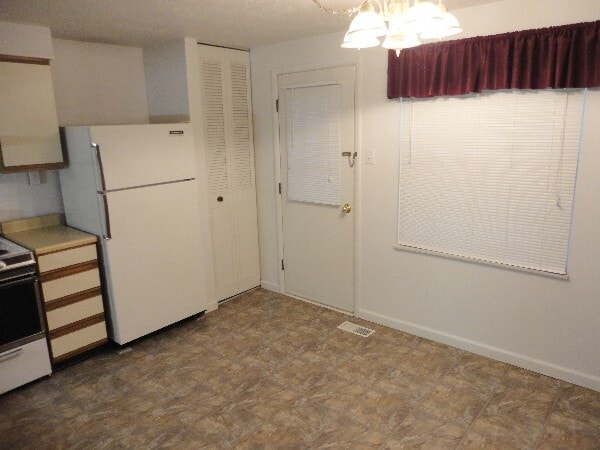 Kitchen, Pantry, Rear Door to Deck - 321 Laporte Ct