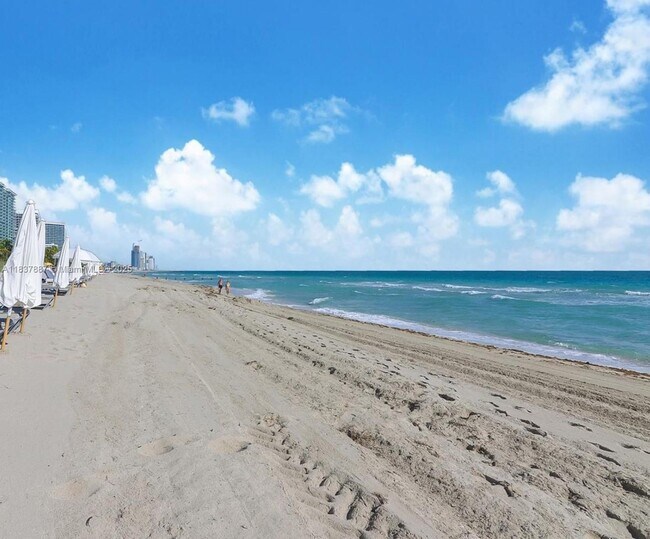 Building Photo - 9801 Collins Ave