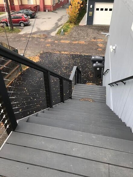stairs leading to apartment and parking space - 343 W 12th Ave