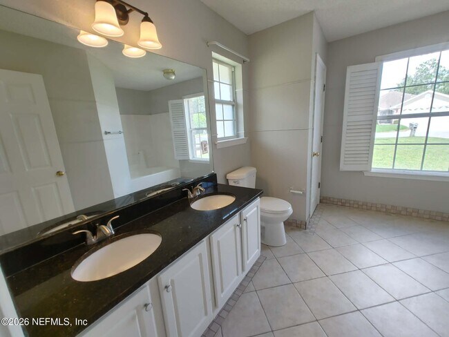 Building Photo - 7548 Cliff Cottage Dr