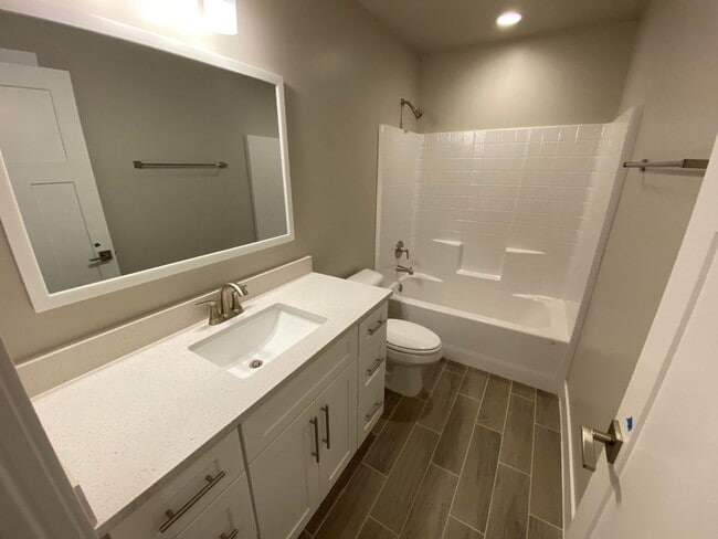Building Photo - 3 Bedroom Townhome. Water, Sewer, and Garbage Included!