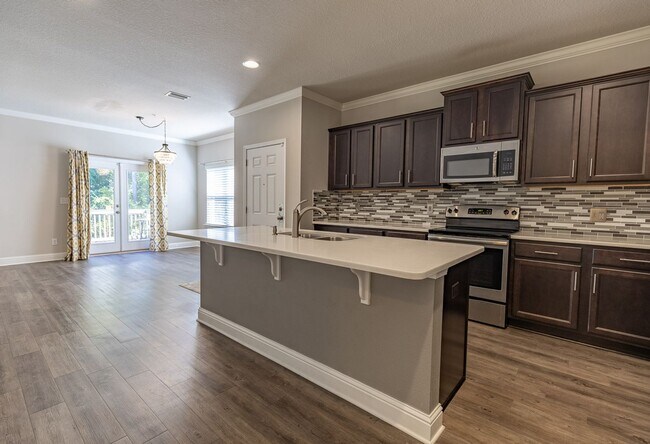 Building Photo - Ground-Floor Condo with Garage in Quail Ho...