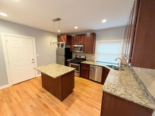 Building Photo - 4204 N Melvina Ave