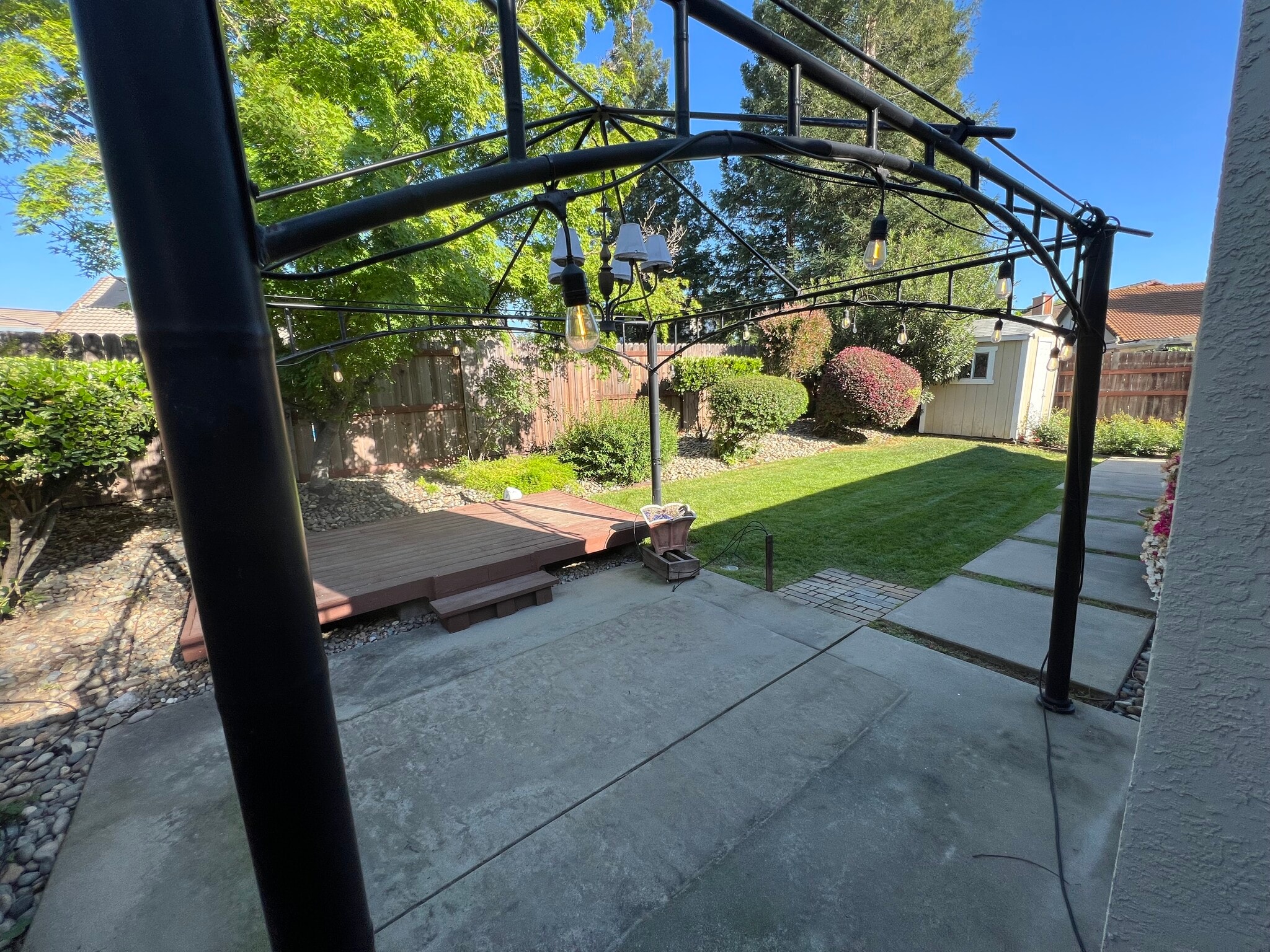 Pleasant backyard and deck. Shed has extra storage space. - 1288 Canevari Dr