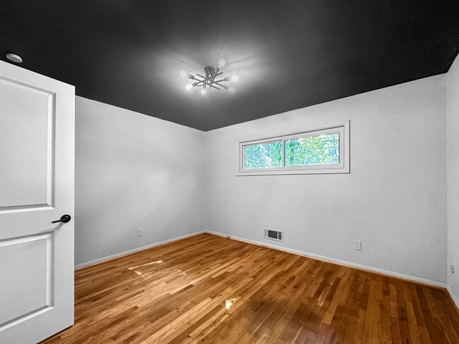 Building Photo - Charming 4BR 2BA w/ Covered Carport • In-Unit Laundry • Front Deck in Chamblee