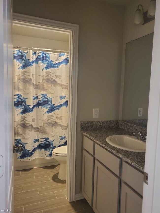 Building Photo - 4 br, 3 bath House - 7442 French Quarter Ct