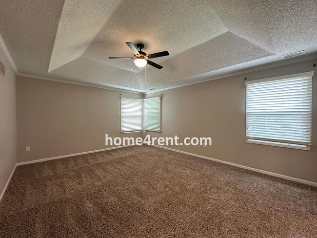 Building Photo - Updated Kitchen, Large Two Tiered Deck, Finished Basement in Blue Valley Schools!