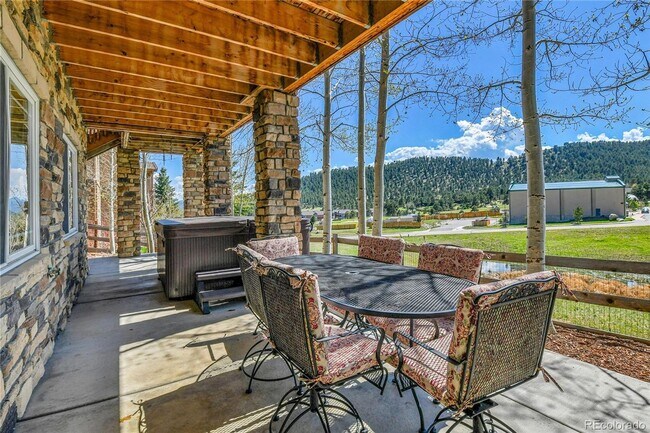 Building Photo - Spacious Colorado Luxury Home with 3-Car Garage, Outdoor Living & Scenic Wildlife