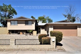 Building Photo - 4640 W Paradise Dr