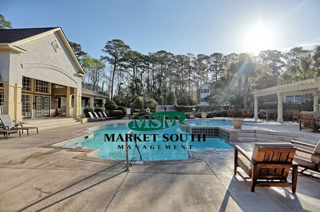 Building Photo - STUNNING GATED COMMUNITY CONDO ON WHITEMAR...