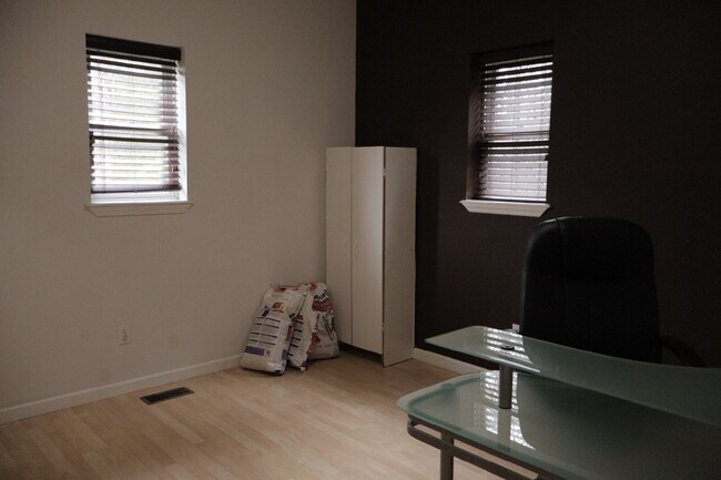 Building Photo - Expansive Mostly-Furnished Residence featuring 3 Bedrooms, a Completed Basement, and a Loft Space