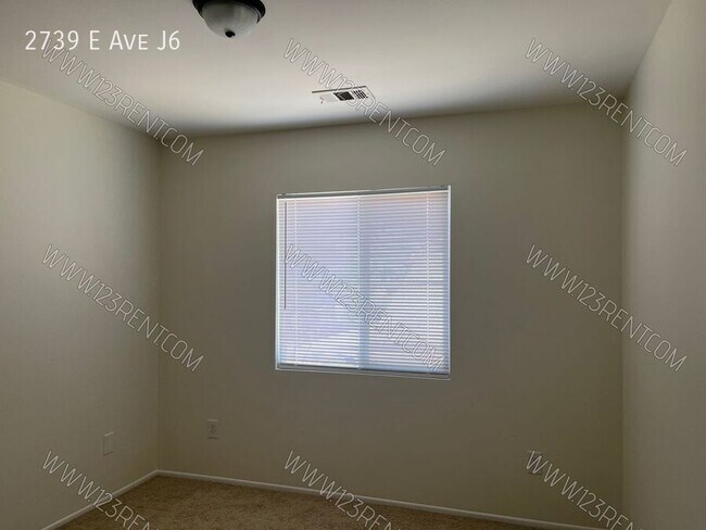 Building Photo - 2739 E Ave J6