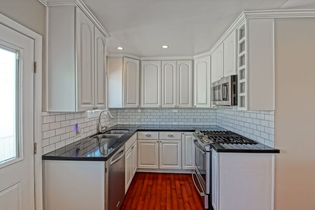 Building Photo - REMODELED, CHARMING & AIRY 3BR2BA HOME W/ OFFICE ON A LARGE LOT W/ NICELY LANDSCAPED FRONT YARD, ...